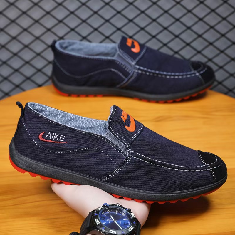 万双红牛仔布豆豆鞋